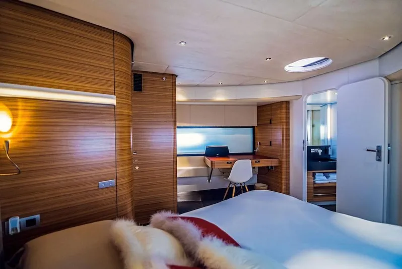  Yacht Photos Pics Luxurious Acico 74 yacht bedroom interior, 2011 model, featuring modern wood paneling and elegant furnishings.