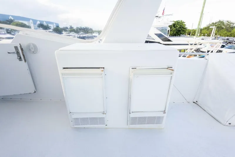  Yacht Photos Pics 1987 Hatteras 70 Cockpit Motor Yacht deck with storage compartments.