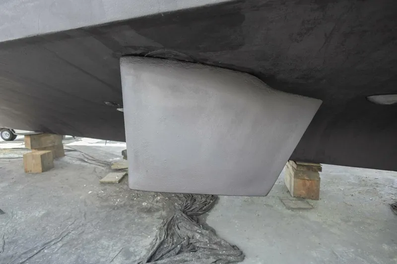  Yacht Photos Pics Close-up of 1987 Hatteras 70 Cockpit Motor Yacht hull detail on dry dock.