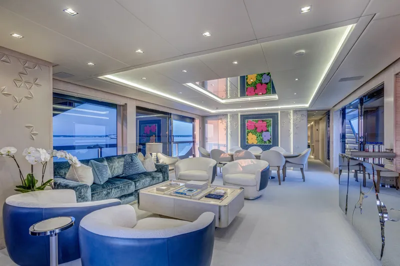 Mystere Yacht Photos Pics Luxurious 2023 Mangusta Gransport yacht interior with modern decor and elegant seating.