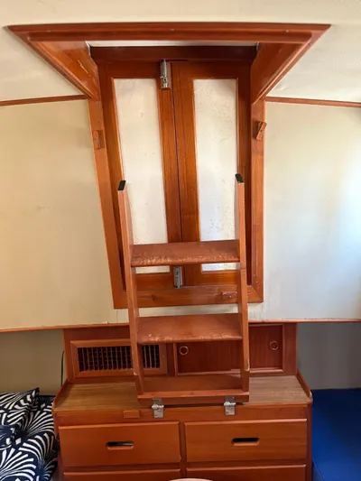  Yacht Photos Pics Wooden interior ladder in 1986 Grand Banks 36 Classic yacht cabin.