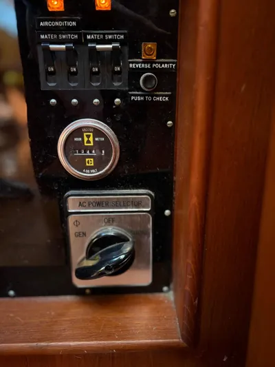  Yacht Photos Pics Control panel of a 1986 Grand Banks 36 Classic boat with switches and power selector.