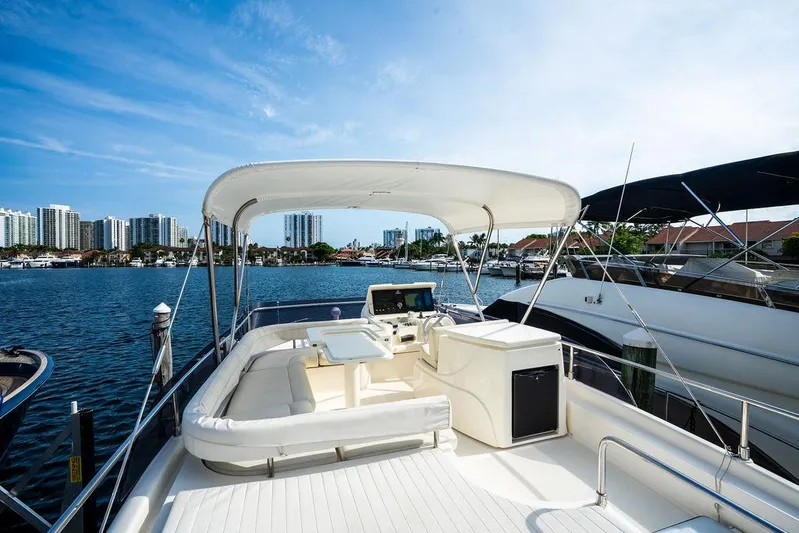  Yacht Photos Pics Luxurious 2009 Ferretti Yachts 470 with spacious deck and scenic waterfront view.