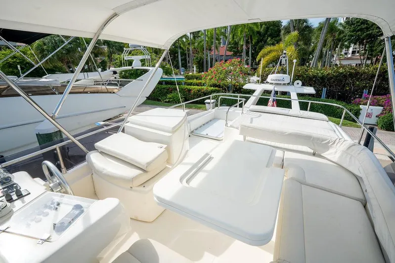  Yacht Photos Pics Luxurious 2009 Ferretti Yachts 470 with spacious outdoor seating and elegant design.