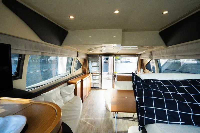  Yacht Photos Pics Luxurious interior of 2009 Ferretti Yachts 470, featuring elegant seating and modern design.