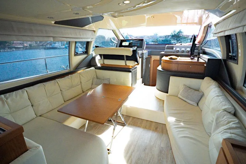  Yacht Photos Pics Luxurious interior of 2009 Ferretti Yachts 470 with elegant seating and modern design.