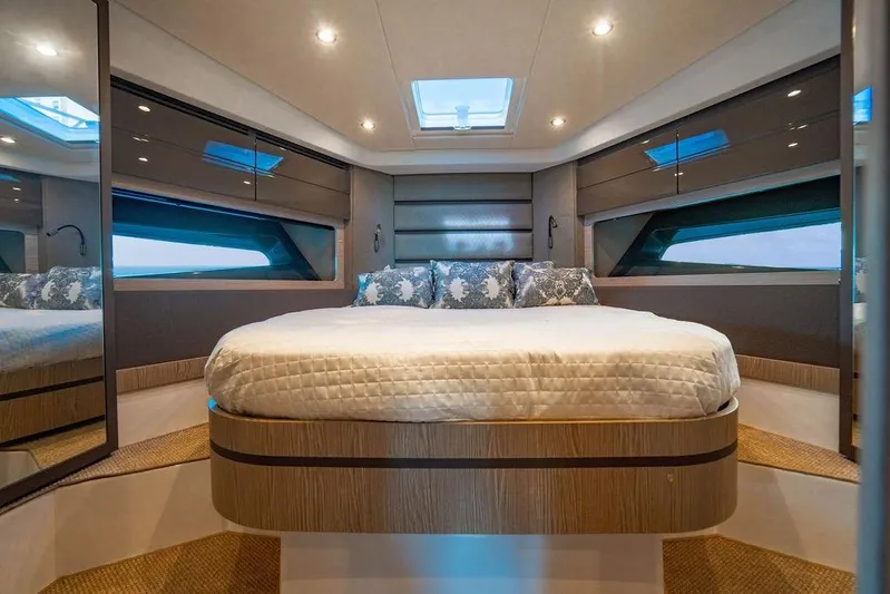 Relax Josephine Yacht Photos Pics Luxurious interior of 2022 Azimut Atlantis 45 yacht with elegant bedding and modern design.