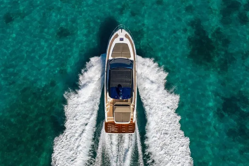 Relax Josephine Yacht Photos Pics Azimut Atlantis 45 yacht cruising on clear turquoise waters, aerial view, 2022 model.