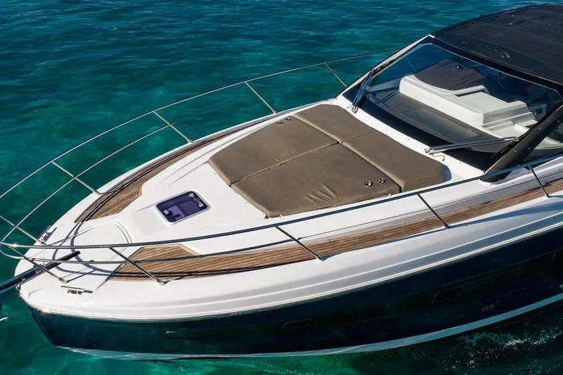 Relax Josephine Yacht Photos Pics 2022 Azimut Atlantis 45 yacht on clear turquoise water, featuring sleek design and sunbathing area.