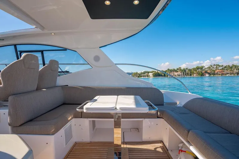 Relax Josephine Yacht Photos Pics Luxurious 2022 Azimut Atlantis 45 yacht interior with elegant seating and scenic ocean view.
