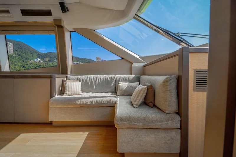 Mcy 70 Hk Yacht Photos Pics Luxurious interior of 2014 Monte Carlo Yachts MCY 70 with scenic window view.