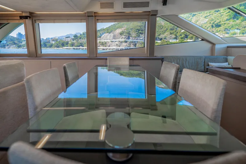 Mcy 70 Hk Yacht Photos Pics Luxurious interior of 2014 Monte Carlo Yachts MCY 70 with scenic window views.