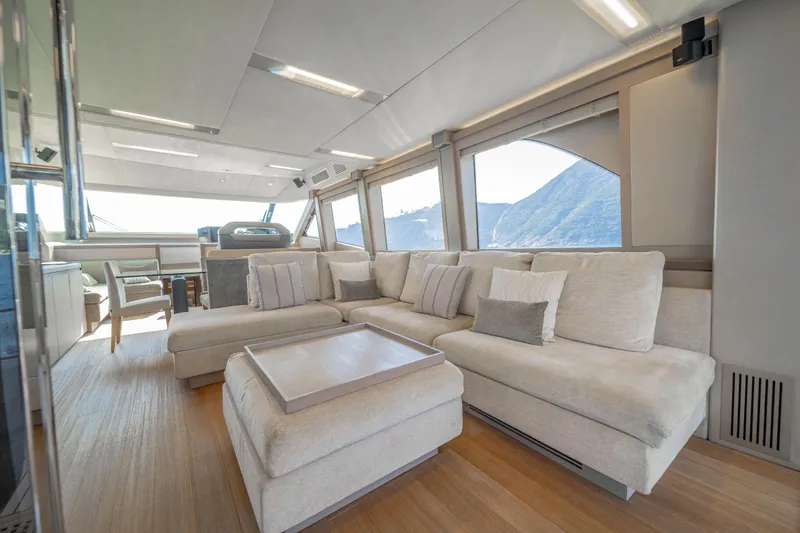 Mcy 70 Hk Yacht Photos Pics Luxurious interior of 2014 Monte Carlo Yachts MCY 70 with elegant seating and panoramic windows.