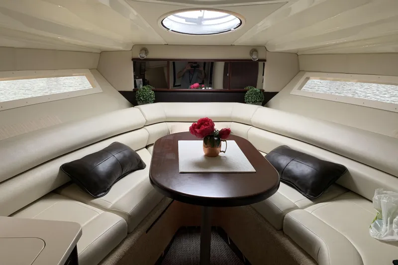  Yacht Photos Pics Luxurious interior of 2017 Monterey 295 Sport Yacht with elegant seating and table.