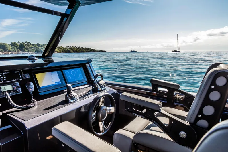 Mazu 42 Yacht Photos Pics Luxurious 2025 Mazu Yachts 42 cockpit with ocean view and advanced navigation systems.