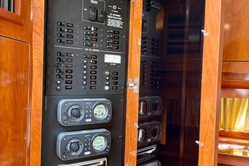  Yacht Photos Pics Control panel of 2008 Four Winns V358 boat with audio system and switches.