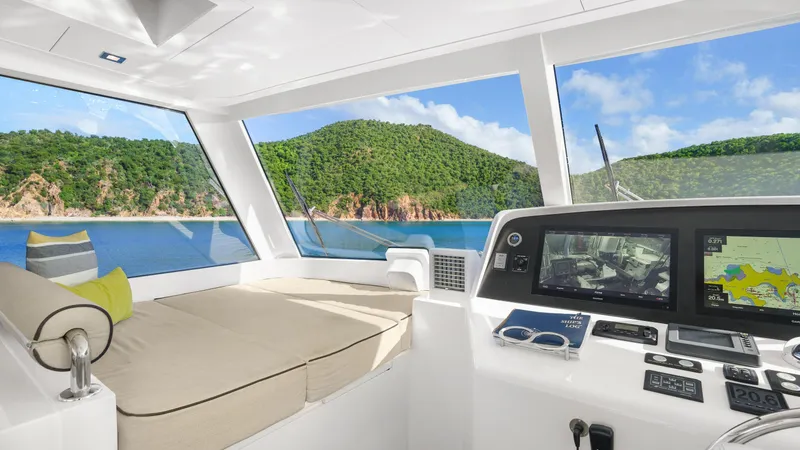 Sea Glass Yacht Photos Pics Luxurious Horizon PC74 yacht interior with scenic ocean view, featuring modern navigation equipment, 2018 model.