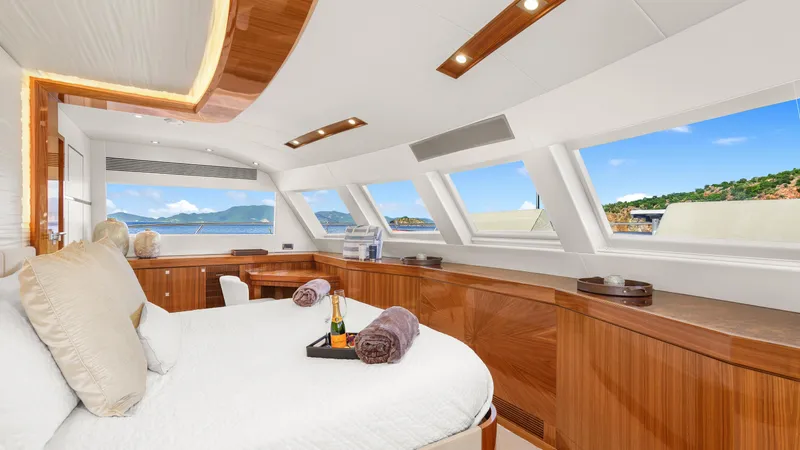 Sea Glass Yacht Photos Pics Luxurious Horizon PC74 yacht interior with panoramic windows and elegant wood finishes, 2018 model.