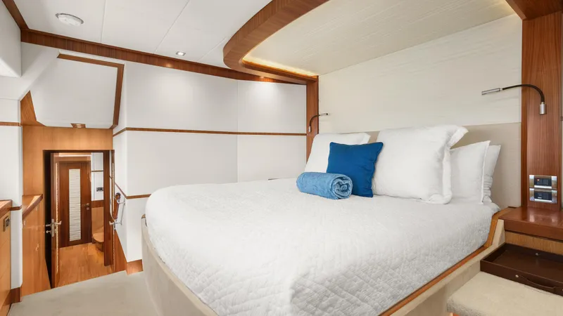 Sea Glass Yacht Photos Pics Luxurious bedroom interior on 2018 Horizon PC74 yacht with modern design and cozy bedding.