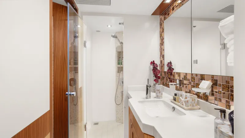 Sea Glass Yacht Photos Pics Luxurious bathroom in 2018 Horizon PC74 yacht with modern fixtures and elegant decor.