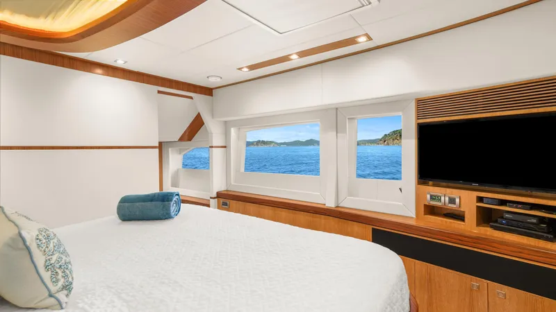 Sea Glass Yacht Photos Pics Luxurious bedroom interior on 2018 Horizon PC74 yacht with ocean view windows.