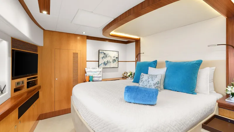 Sea Glass Yacht Photos Pics Luxurious 2018 Horizon PC74 yacht bedroom with modern decor and plush bedding.