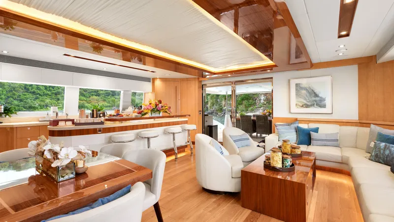 Sea Glass Yacht Photos Pics Luxurious Horizon PC74 yacht interior with elegant seating, dining area, and modern decor, 2018 model.