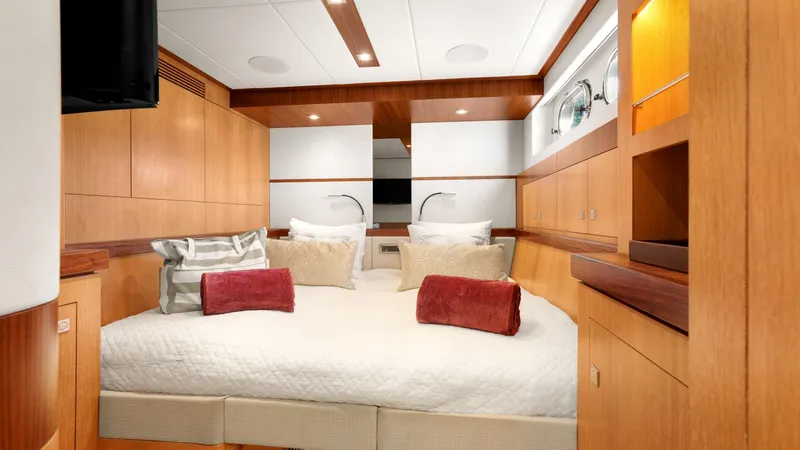 Sea Glass Yacht Photos Pics Luxurious cabin interior of 2018 Horizon PC74 yacht with modern wood finishes.