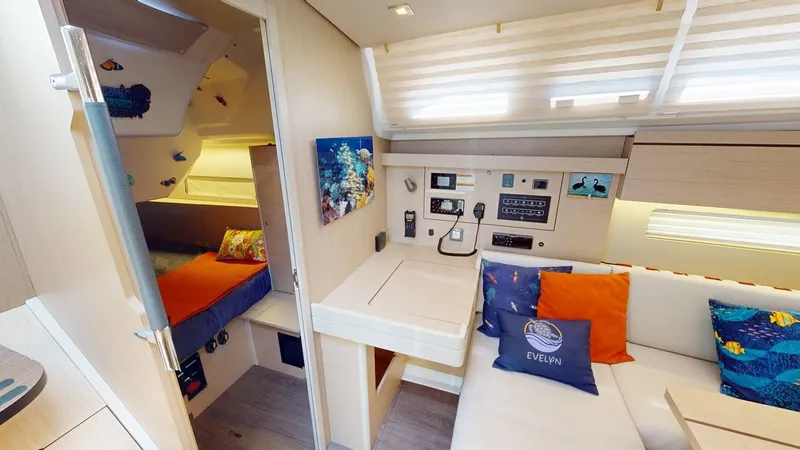 Evelyn Yacht Photos Pics Interior of 2021 Beneteau Oceanis 40.1 yacht with cozy seating and navigation station.
