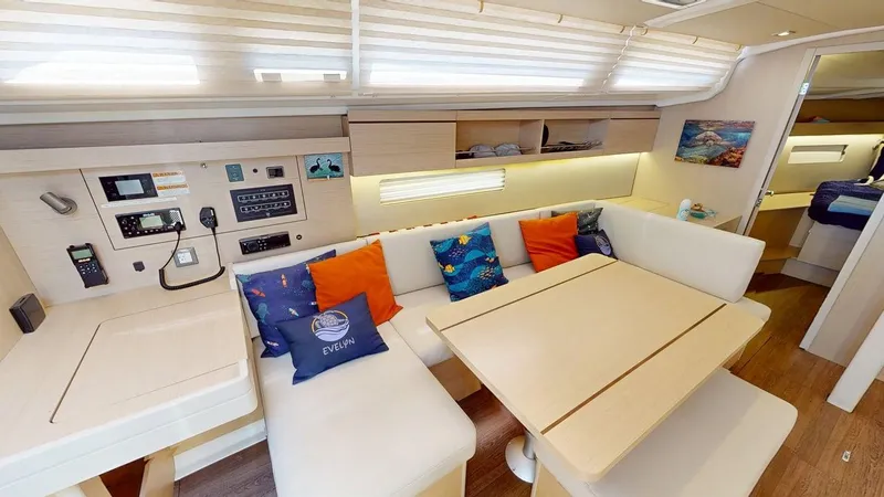 Evelyn Yacht Photos Pics Interior of 2021 Beneteau Oceanis 40.1 yacht with cozy seating and navigation controls.