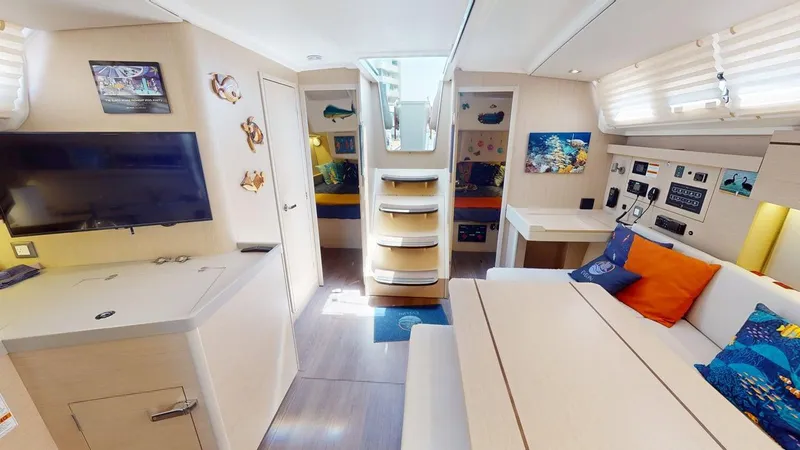 Evelyn Yacht Photos Pics Interior of 2021 Beneteau Oceanis 40.1 yacht, featuring modern decor and comfortable seating.