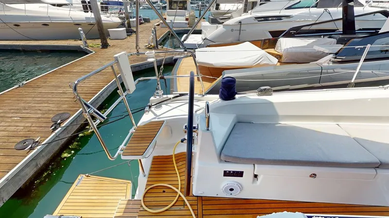 Evelyn Yacht Photos Pics Beneteau Oceanis 40.1 yacht, 2021 model, docked at marina with wooden deck.