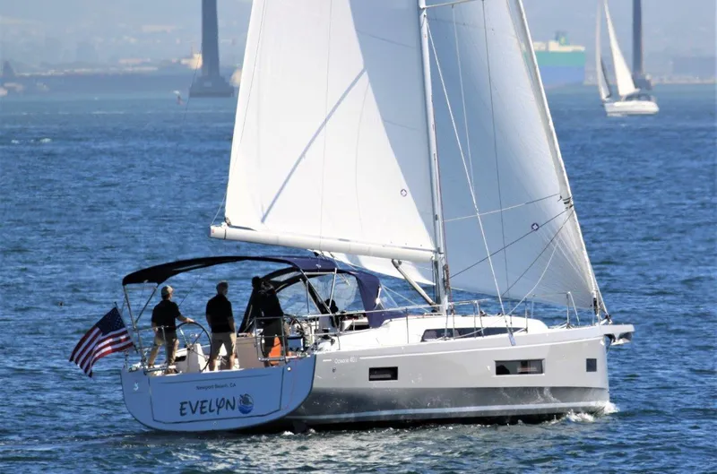 Evelyn Yacht Photos Pics 2021 Beneteau Oceanis 40.1 sailing on open water with crew onboard.