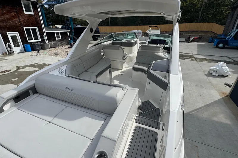  Yacht Photos Pics 2021 Sea Ray 310 SLX boat interior with luxurious seating and modern design.