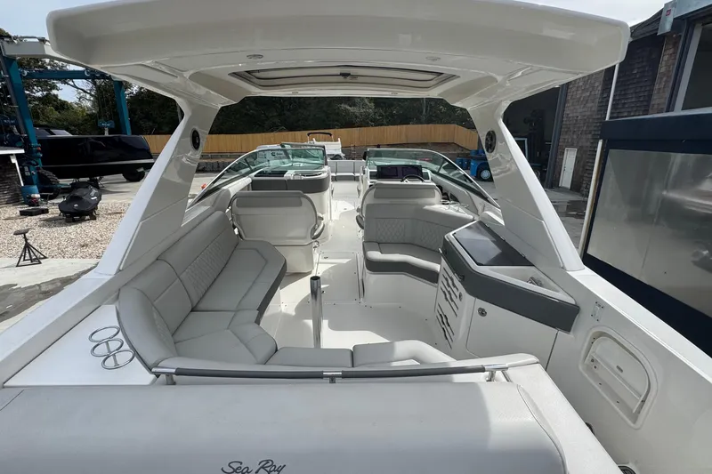  Yacht Photos Pics 2021 Sea Ray 310 SLX boat interior with spacious seating and modern design.
