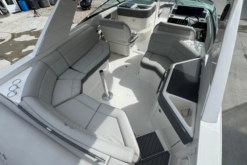  Yacht Photos Pics 2021 Sea Ray 310 SLX boat interior with luxurious seating and modern dashboard.