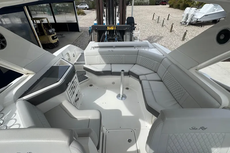  Yacht Photos Pics Luxurious interior of 2021 Sea Ray 310 SLX boat with spacious seating and modern design.