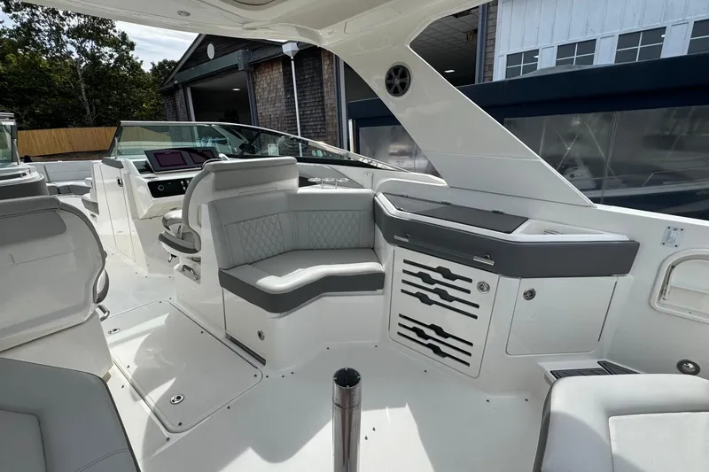  Yacht Photos Pics 2021 Sea Ray 310 SLX boat interior with luxurious seating and modern design.