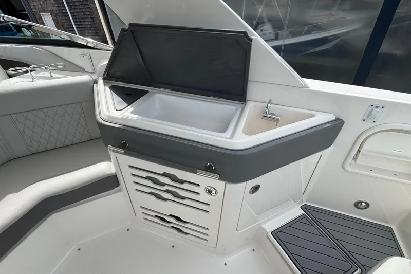  Yacht Photos Pics Interior of 2021 Sea Ray 310 SLX boat featuring a sleek kitchenette area.