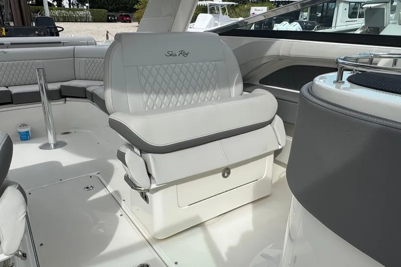  Yacht Photos Pics Luxurious interior of 2021 Sea Ray 310 SLX boat with plush seating and modern design.