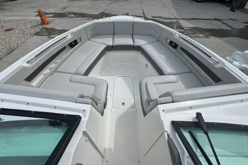  Yacht Photos Pics 2021 Sea Ray 310 SLX boat with spacious seating and sleek design.