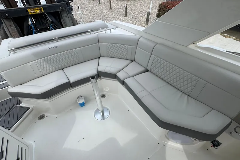  Yacht Photos Pics Luxurious seating area on a 2021 Sea Ray 310 SLX boat, featuring elegant upholstery.