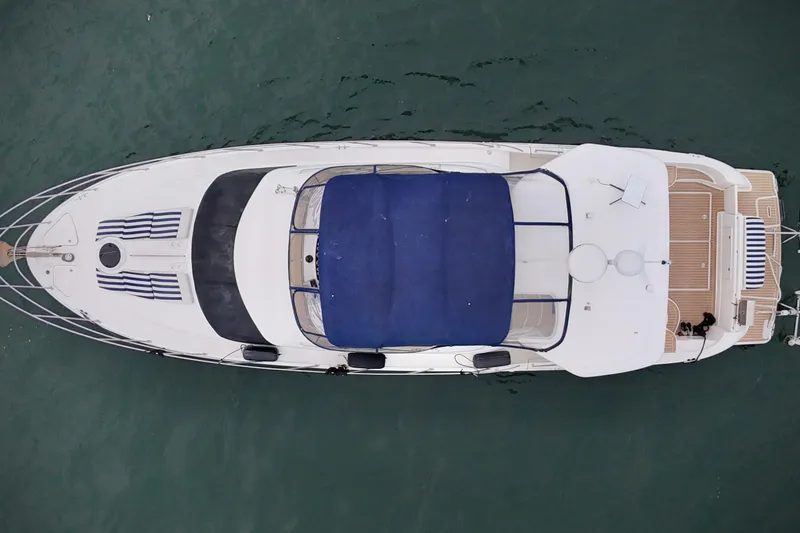 Shake N' Bake Yacht Photos Pics Aerial view of 2006 Meridian Motoryacht on calm water.