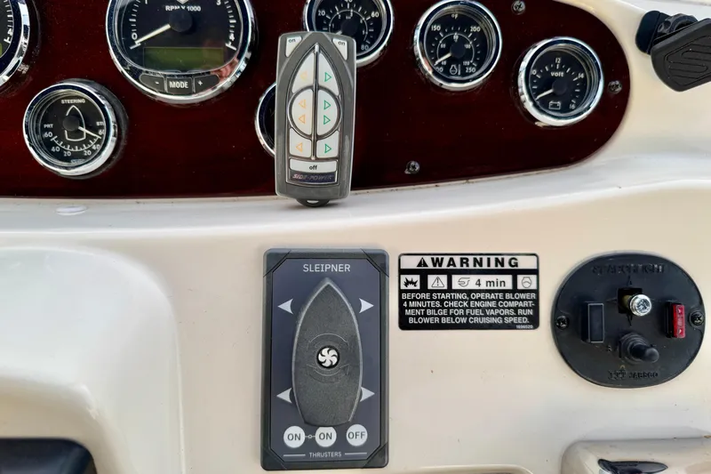 Shake N' Bake Yacht Photos Pics Control panel of a 2006 Meridian Motoryacht with gauges and warning labels.