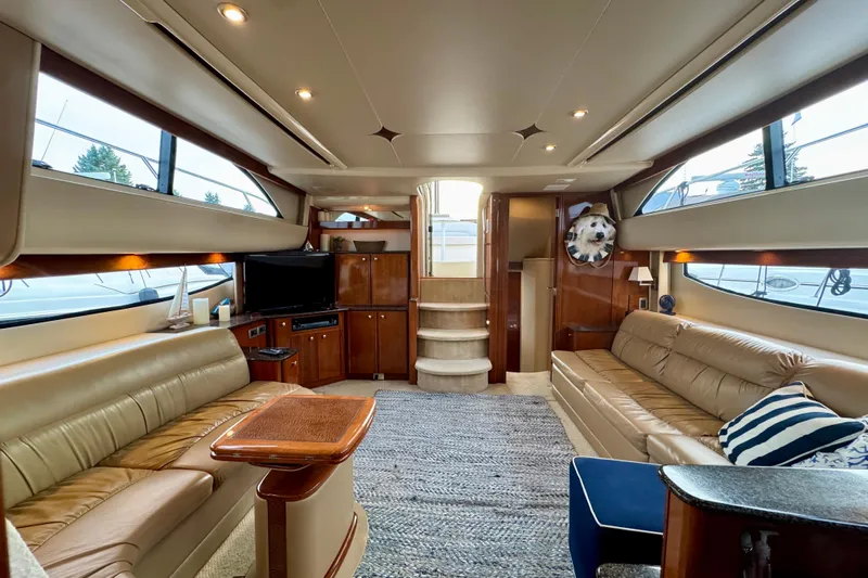 Shake N' Bake Yacht Photos Pics Luxurious interior of a 2006 Meridian Motoryacht with leather seating and elegant wood finishes.