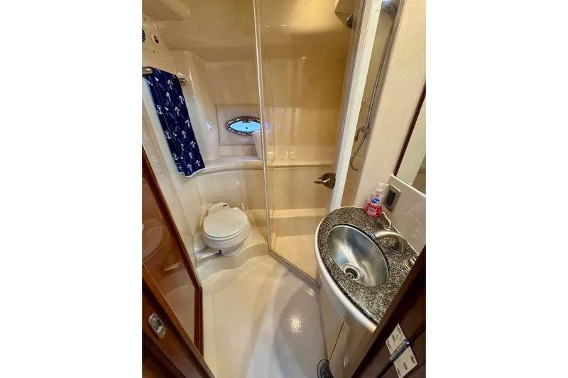 Shake N' Bake Yacht Photos Pics Bathroom of 2006 Meridian Motoryacht with shower, sink, and toilet.