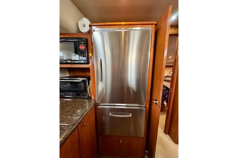 Shake N' Bake Yacht Photos Pics Stainless steel kitchen appliances in 2006 Meridian Motoryacht interior.