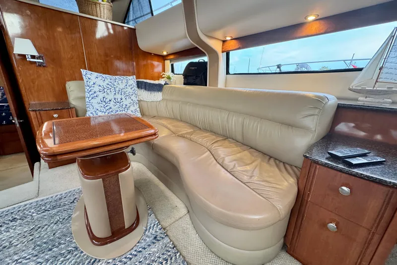 Shake N' Bake Yacht Photos Pics Luxurious 2006 Meridian Motoryacht interior with leather seating and elegant wooden finishes.