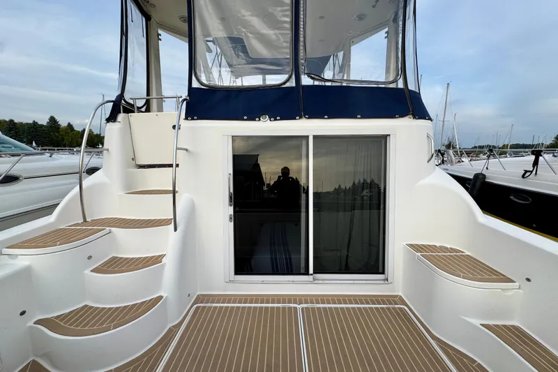 Shake N' Bake Yacht Photos Pics 2006 Meridian Motoryacht with steps and sliding door, docked at marina.