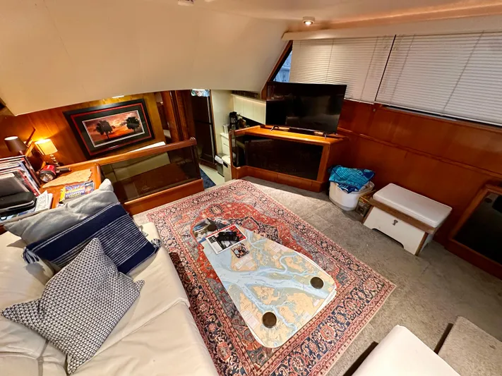 Sea Suite Yacht Photos Pics Luxurious interior of 1989 Viking 44 Motor Yacht with cozy seating and elegant decor.